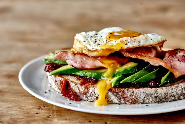 Bacon, tomato & tamarind relish with avocado & fried egg on sourdough