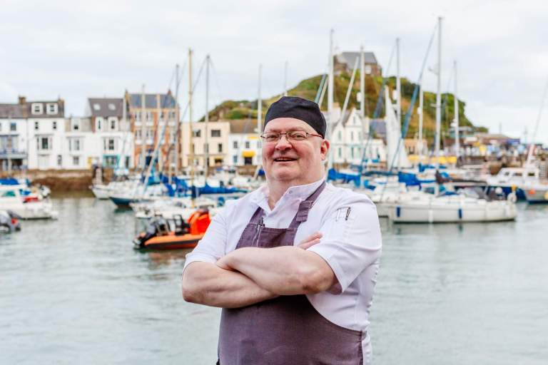 Eliot Seabourn-wren, owner and chef, The Carlton Hotel, on the Ilfracombe quayside