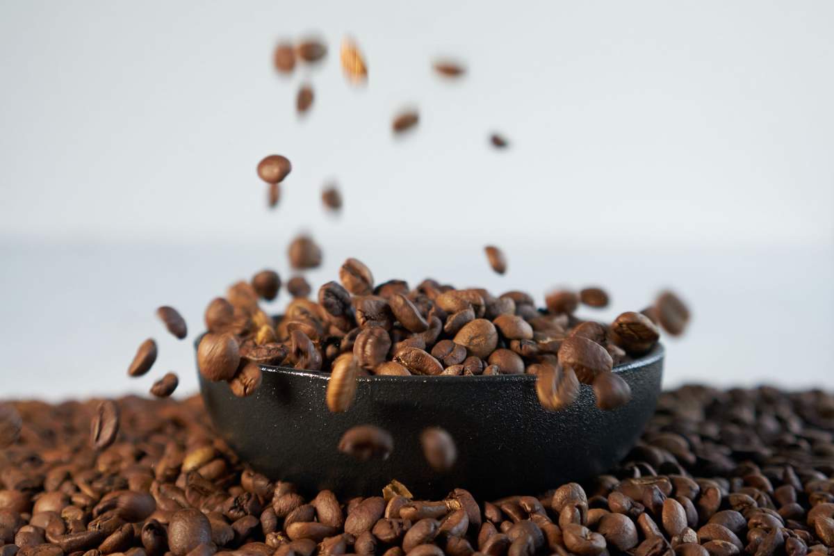 Gaia Coffee Beans dropping into a bowl