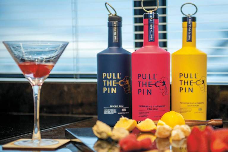 3 bottles of Pull the Pin rum.