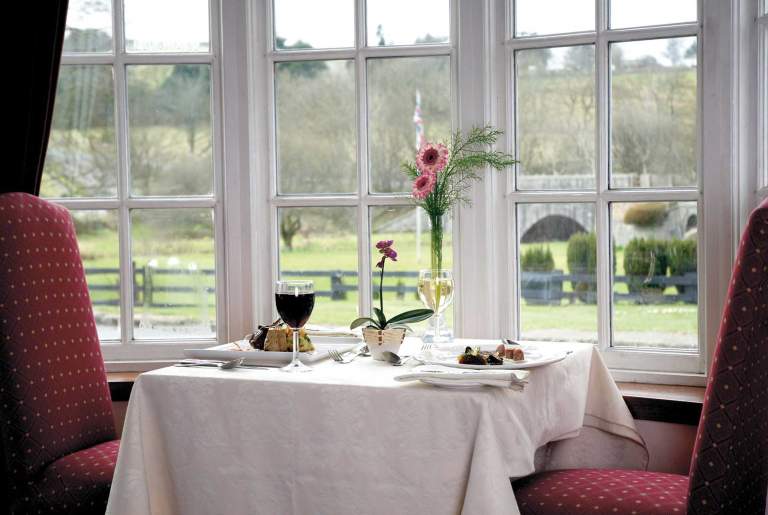 View of the gardens from the restaurant in the Two Bridges Hotel, Dartmoor